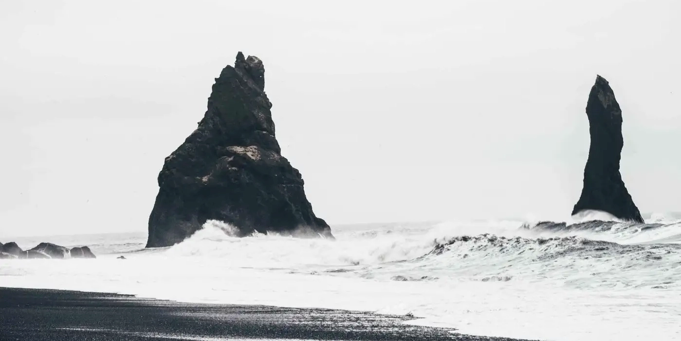 Black and white photograph of waves at the beach